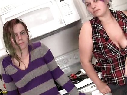 Chubby lesbian cowgirl pissing in the kitchen after getting her pussy fingered